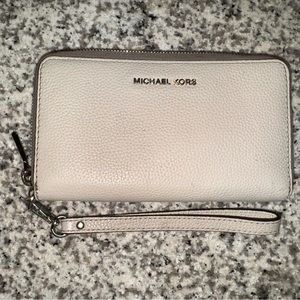 Beige/grey Michel Kors wristlet